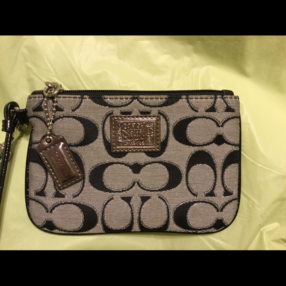 Cutest Coach wristlet NWTs. Black & silver. NWOTs.